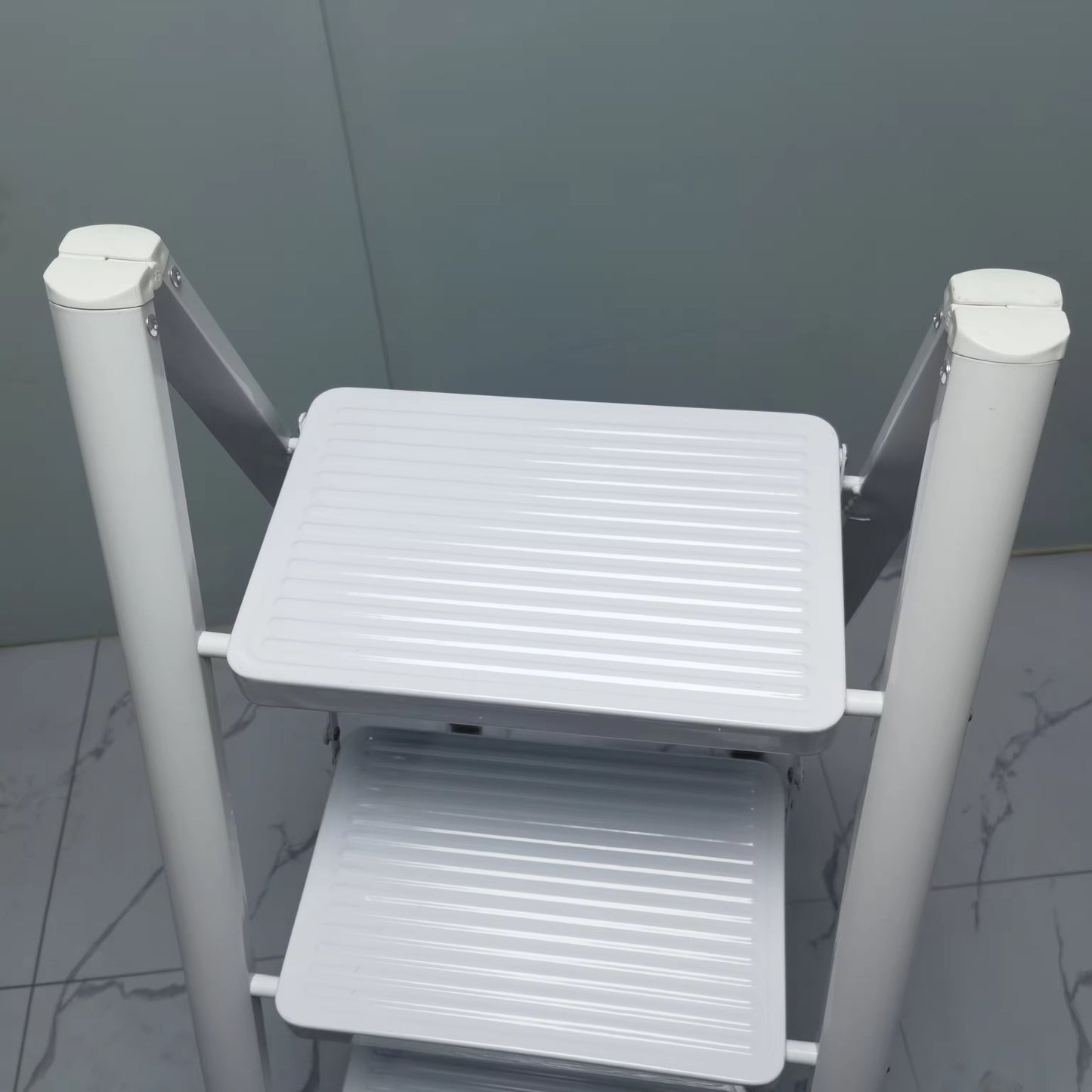 Multi-Functional 4-Step Indoor Folding Ladder – Carbon Steel Construction with Telescopic Design, Anti-Slip Rubber Grip Steps, Modern Space-Saving Style, Portable and Compact for Household Use, High Load Capacity for Safe Climbing and Versatile Home Tasks